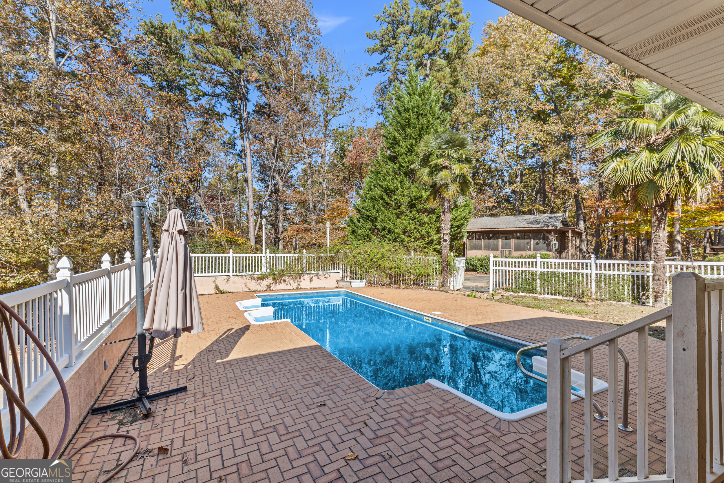 593 Cross Creek Drive Toccoa, GA 30577 - Photo 51 of 55 a view of a swimming pool with a patio