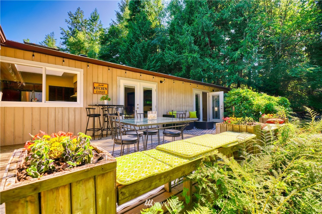 2172 Foxhole Road Point Roberts, WA 98281 - Photo 6 of 40 a view of a backyard with sitting area