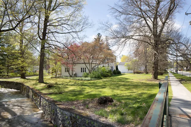 a view of yard with swimming pool