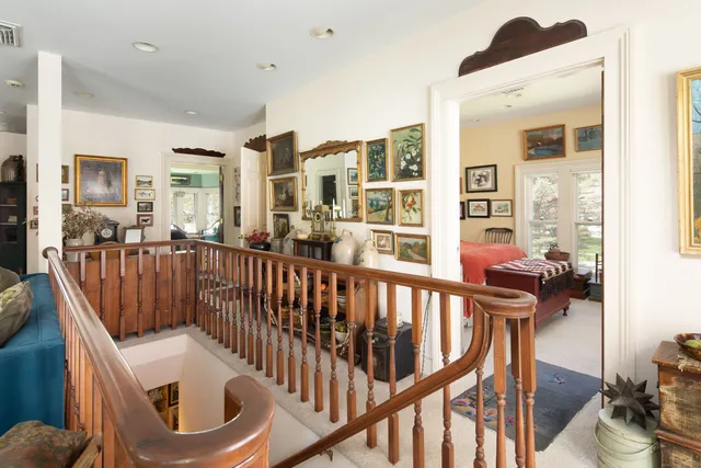 a view of a living room and balcony
