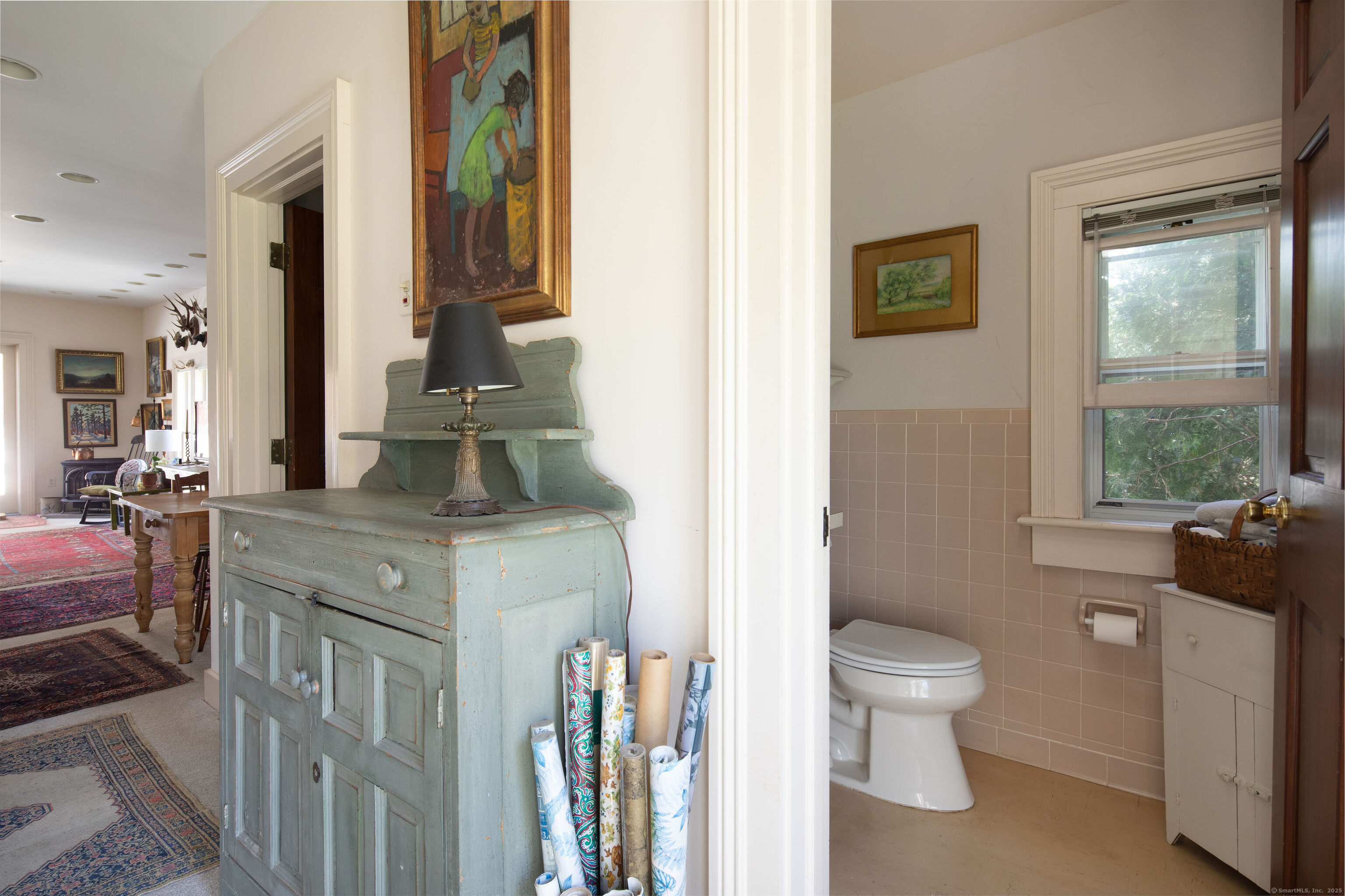 308 Main Street Salisbury, CT 06039 - Photo 30 of 35 a bathroom with a granite countertop toilet a sink and a large mirror