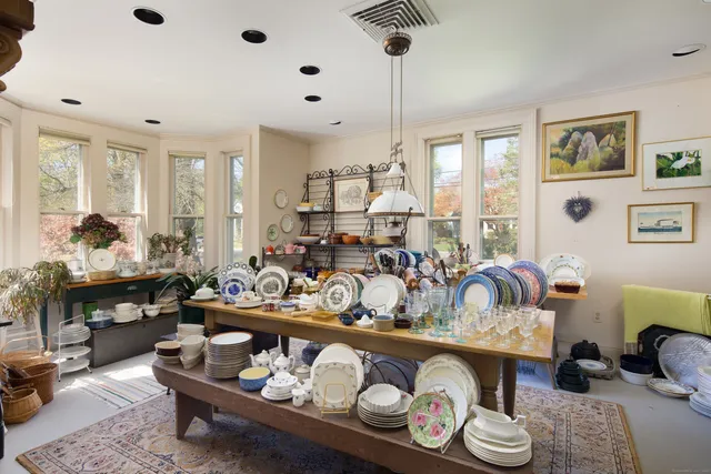 a very nice looking living room with furniture and a large window