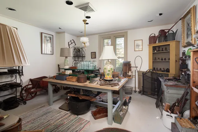 a view of a workspace and dining room