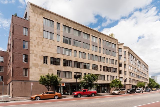 a cars parked in front of a building