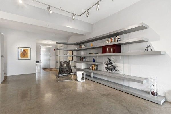 a view of a room with racks on the wall