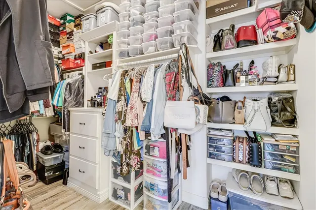 a room with lots of different colored cloths