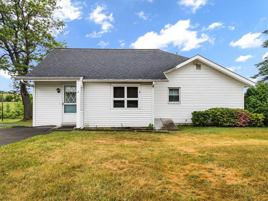 681 Herman Road Butler, PA 16002 - Photo 2 of 28 a view of a house with a yard