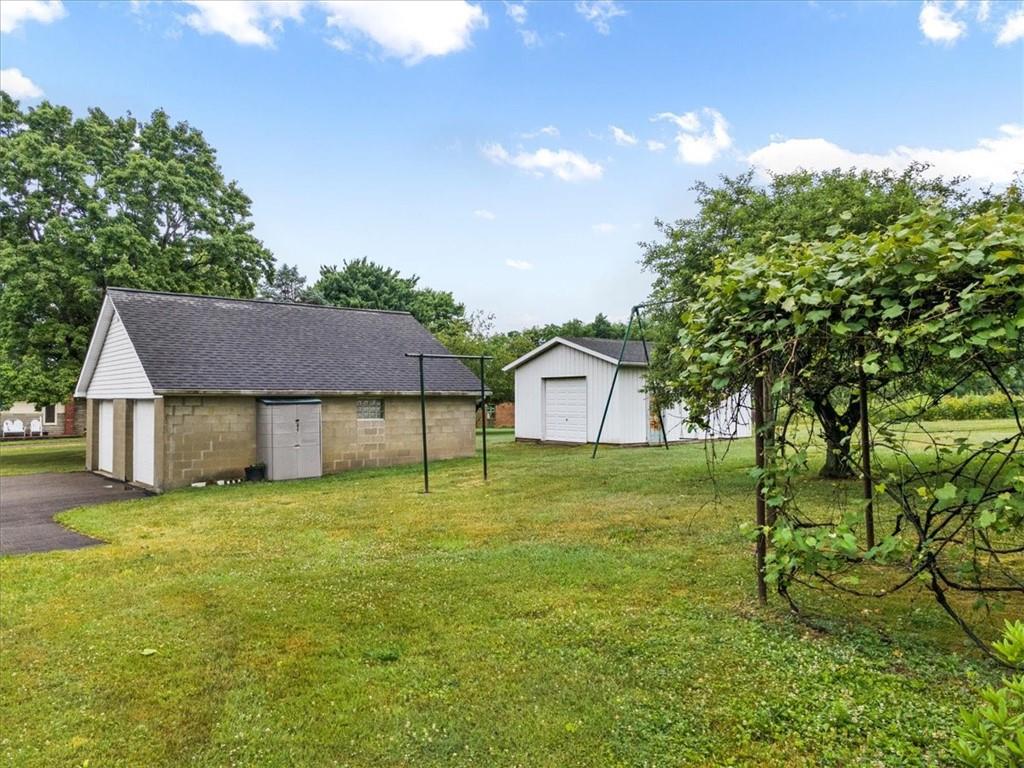 681 Herman Road Butler, PA 16002 - Photo 27 of 28 a house view with a garden space