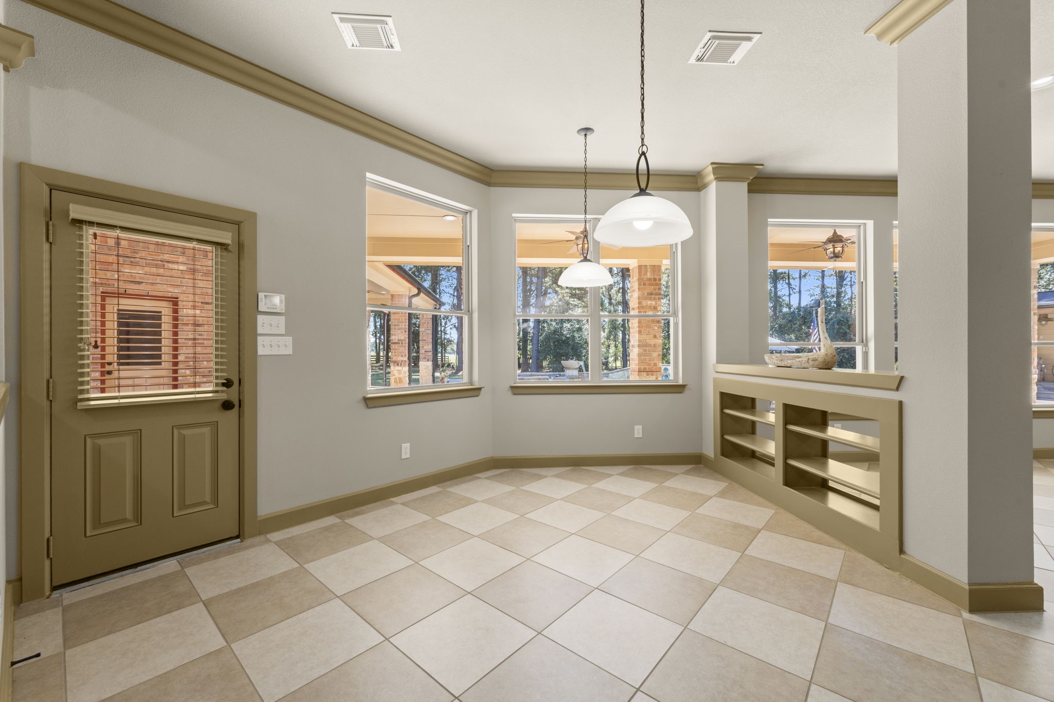 1534 Virgie Community Road Magnolia, TX 77354 - Photo 21 of 50 Breakfast nook with door leading to the backyard oasis.
