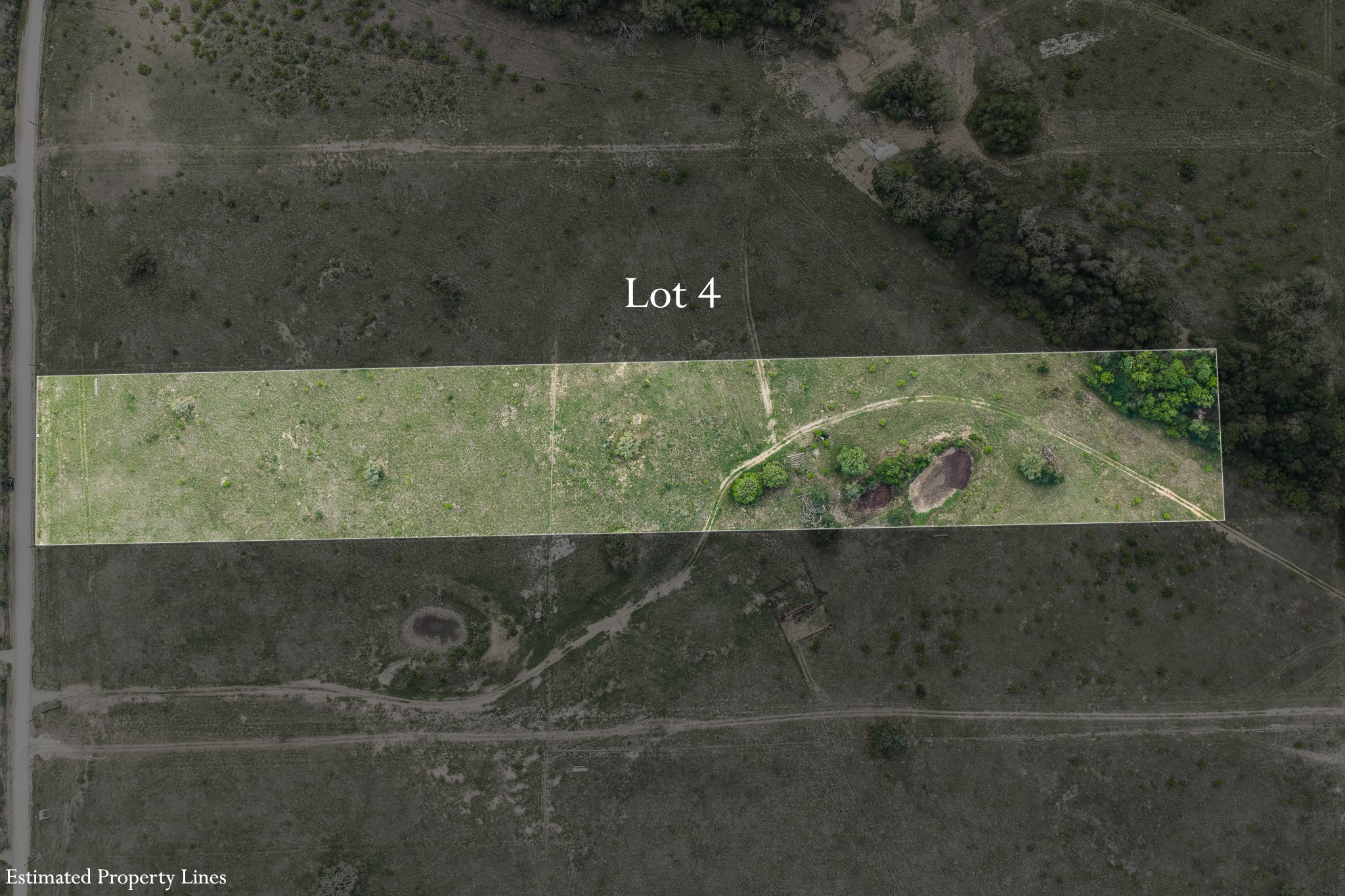 Tbd Lot 4 Tbd Road Dale, TX 78616 - Photo 1 of 24 Discover Lot 4, a serene expanse featuring green fields and natural water features.