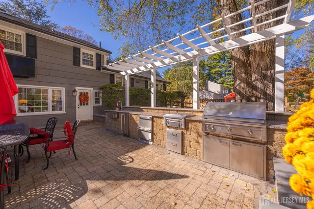 a view of a tables and chairs in a patio
