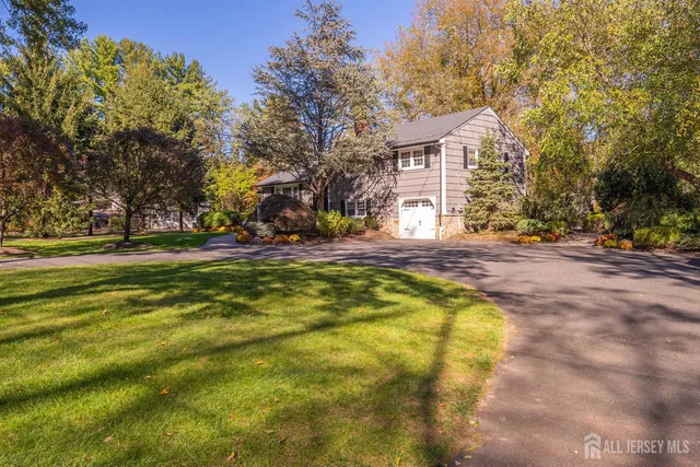 a view of a house with basketball court