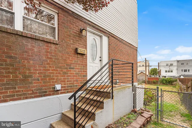 a view of a balcony with chairs