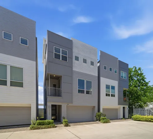 a front view of a building with street view