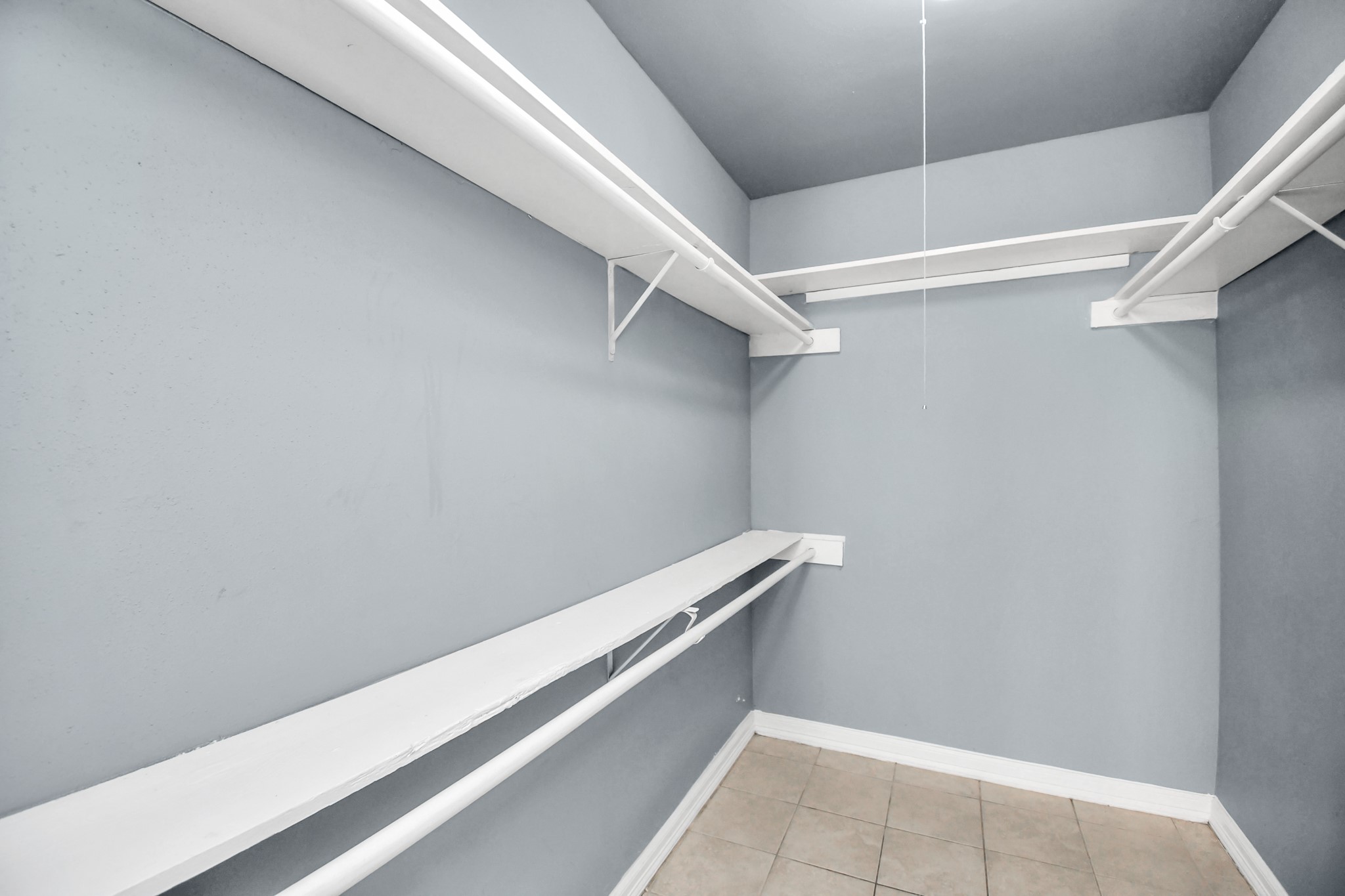 5959 Bonhomme Road, Unit 204R Houston, TX 77036 - Photo 26 of 27 a view of an empty walk in closet