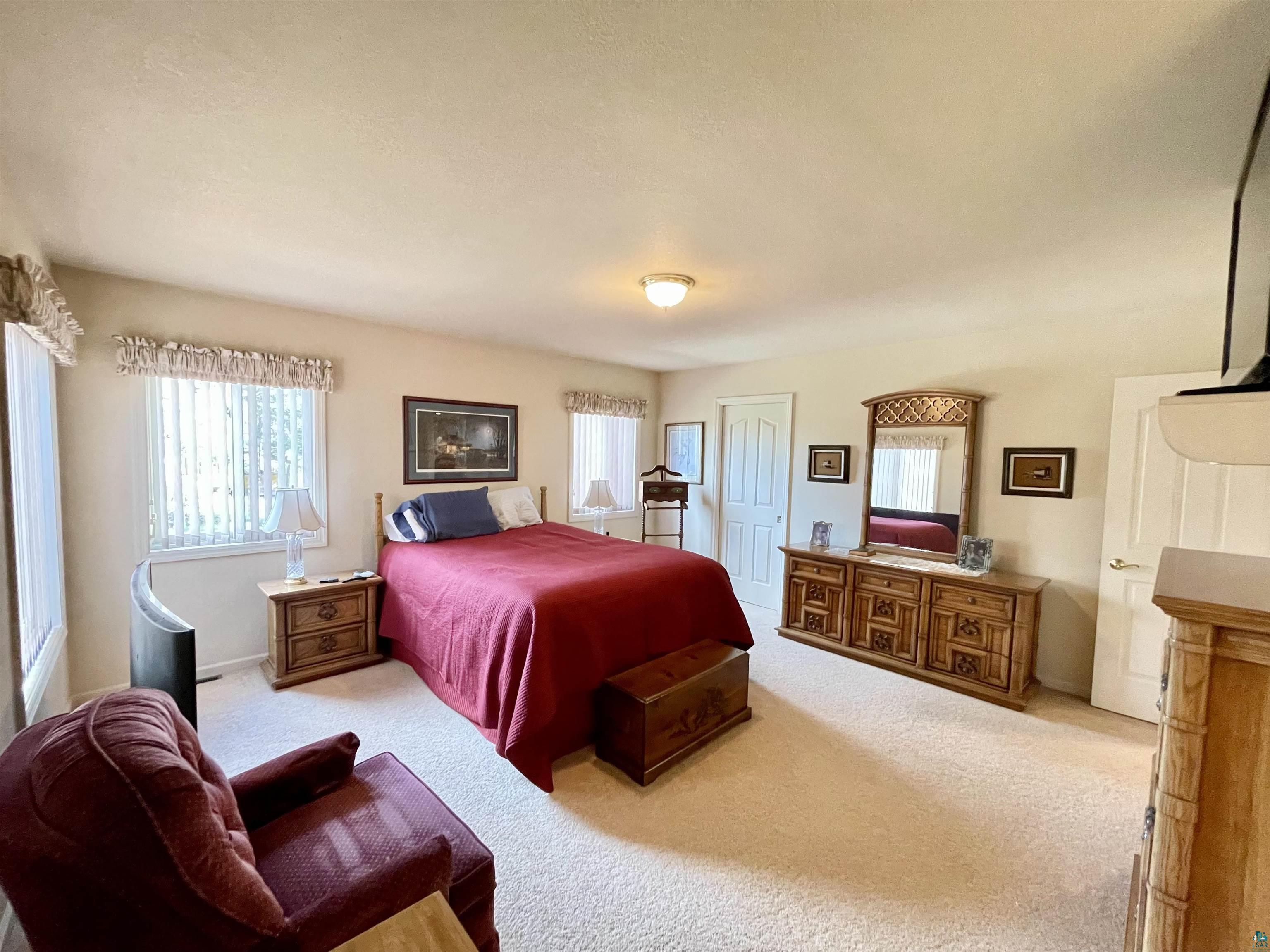 183 Cramer Road Schroeder, MN 55613 - Photo 19 of 50 Main floor master bedroom.