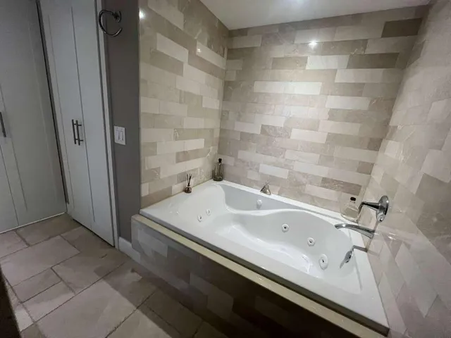 a bathroom with a sink and a bathtub