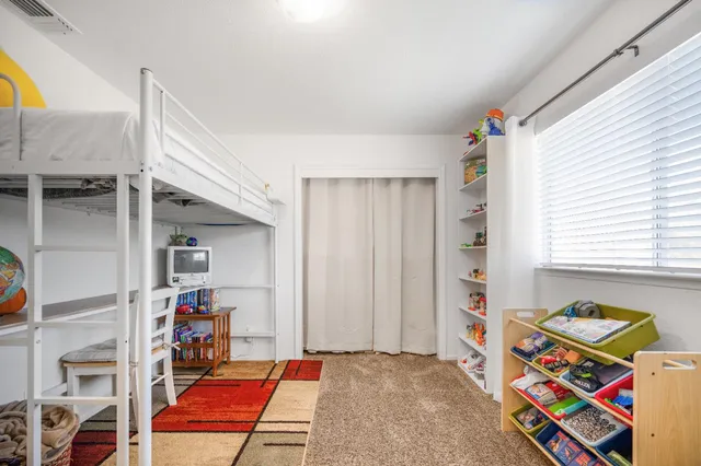 a room with furniture and a window