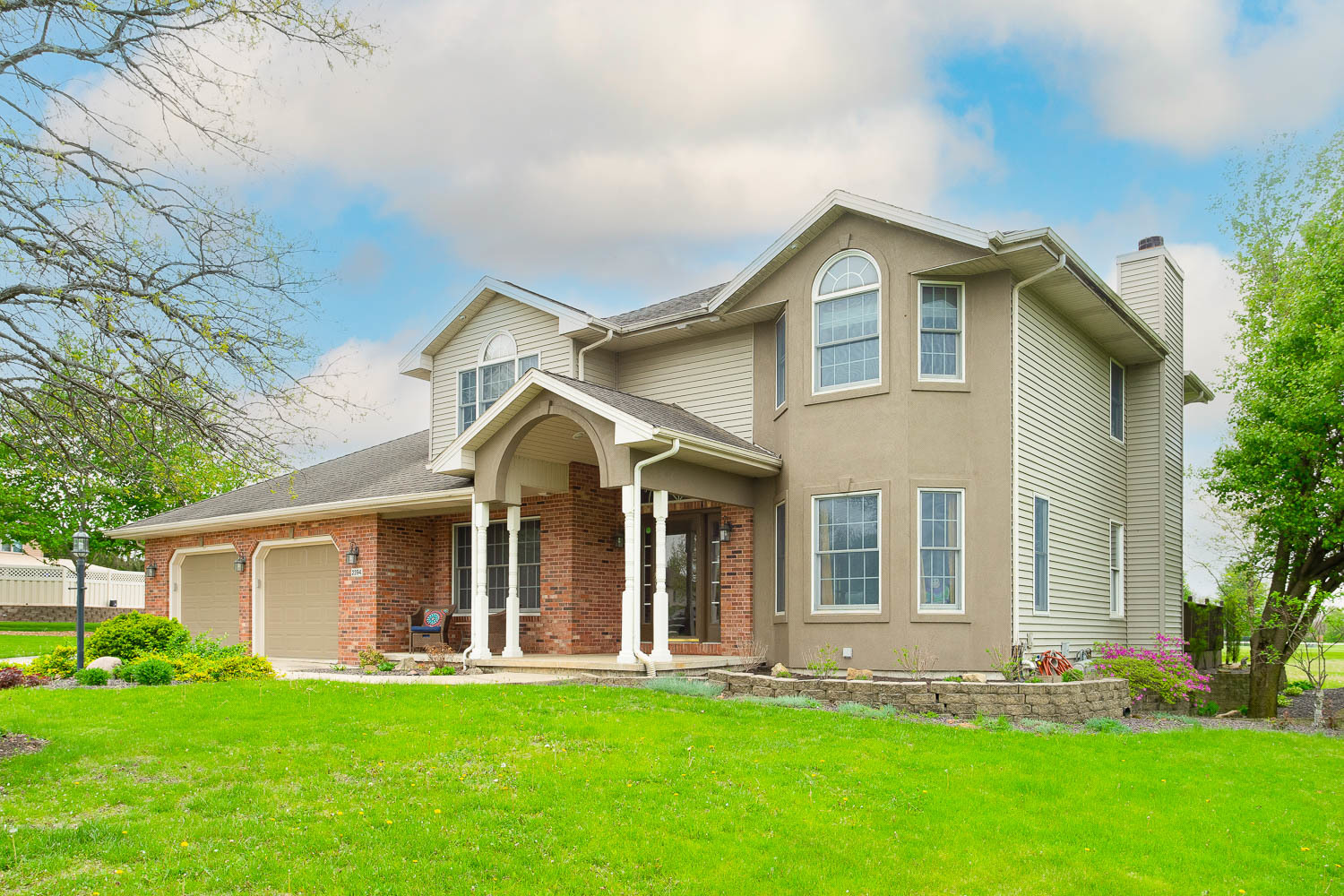 2394 Valley View Drive Kankakee, IL 60901 - Photo 16 of 73 a front view of a house with a yard