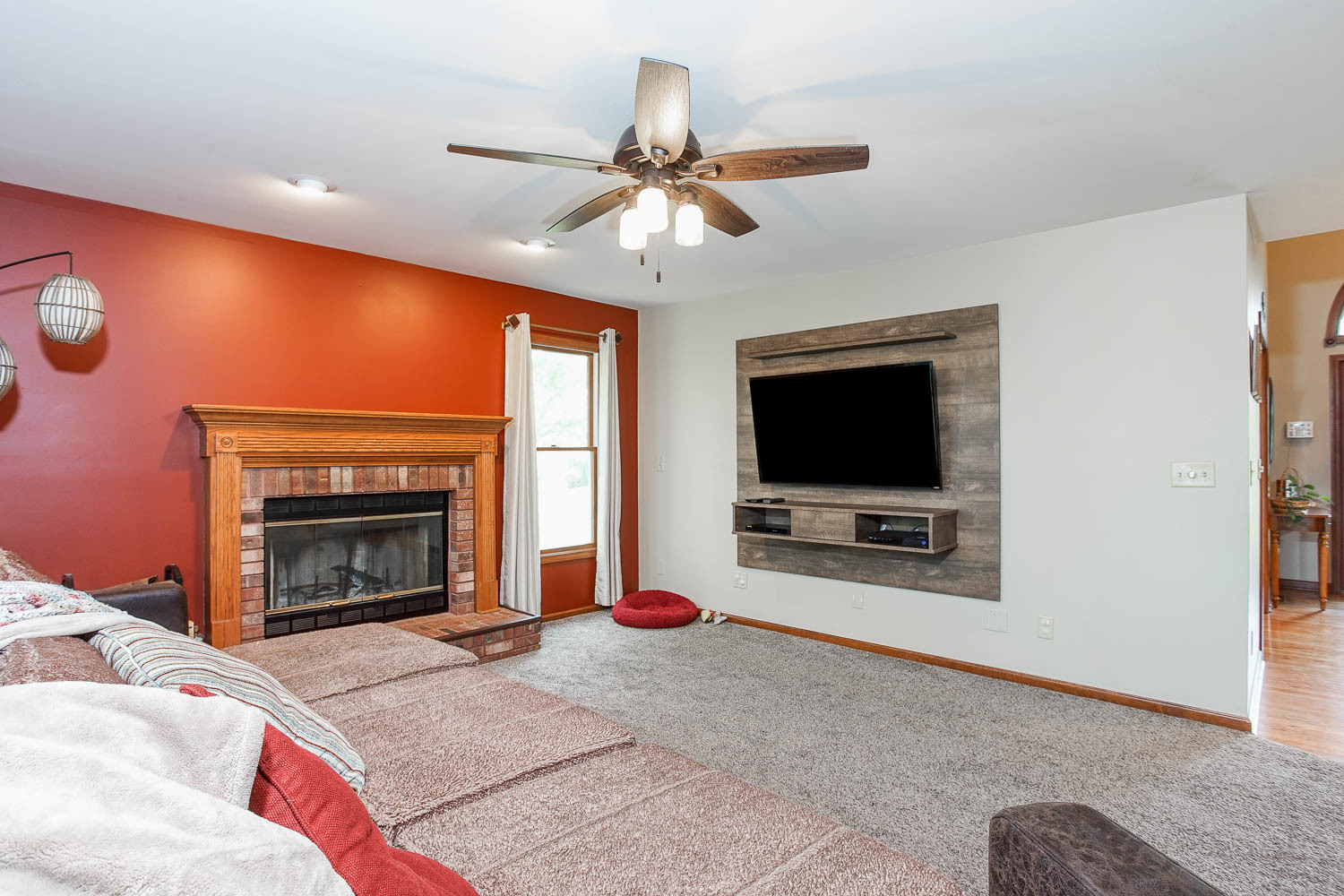 2394 Valley View Drive Kankakee, IL 60901 - Photo 25 of 73 a living room with furniture and a flat screen tv