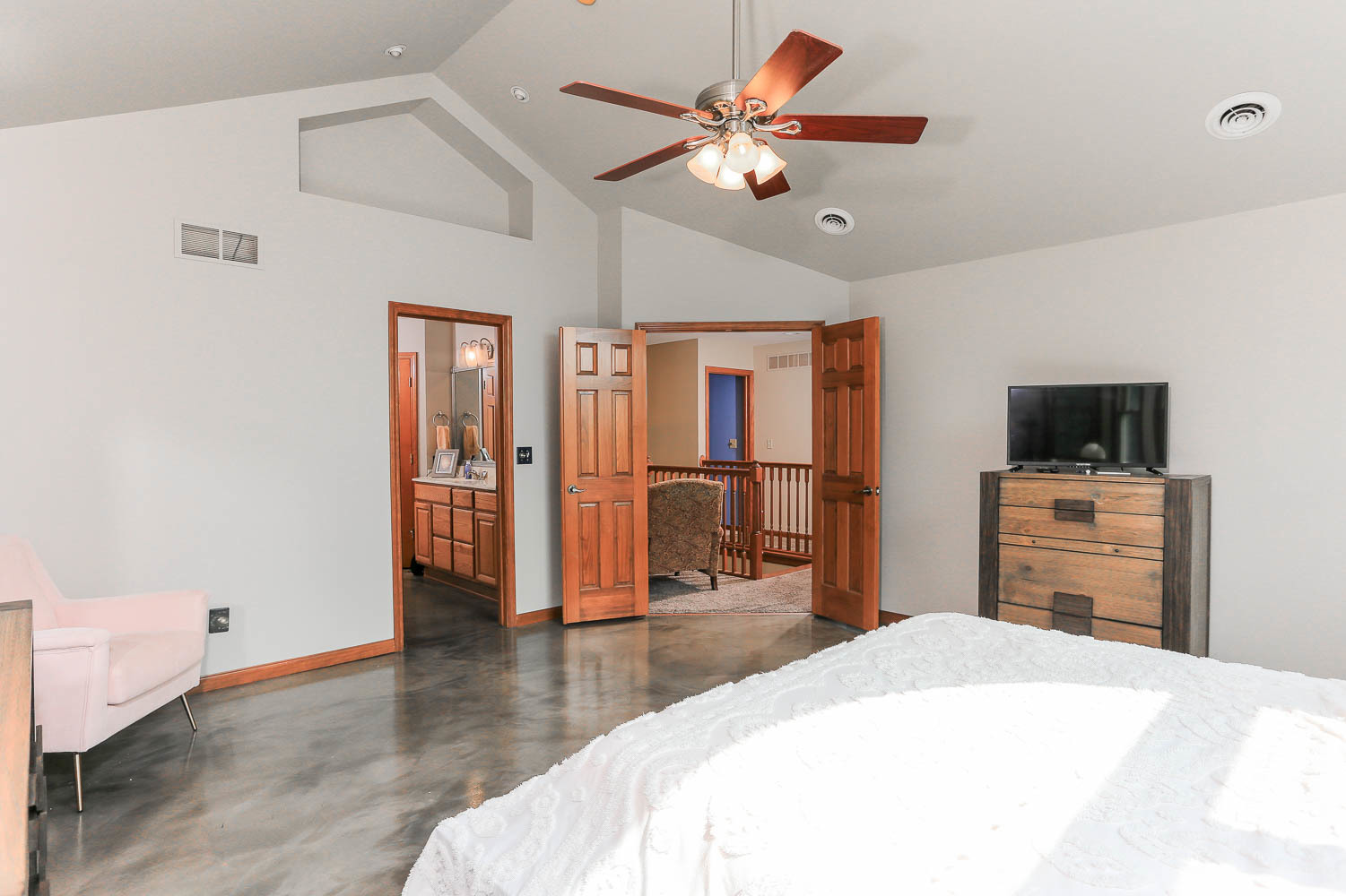 2394 Valley View Drive Kankakee, IL 60901 - Photo 38 of 73 a bedroom with a bed and a flat screen tv