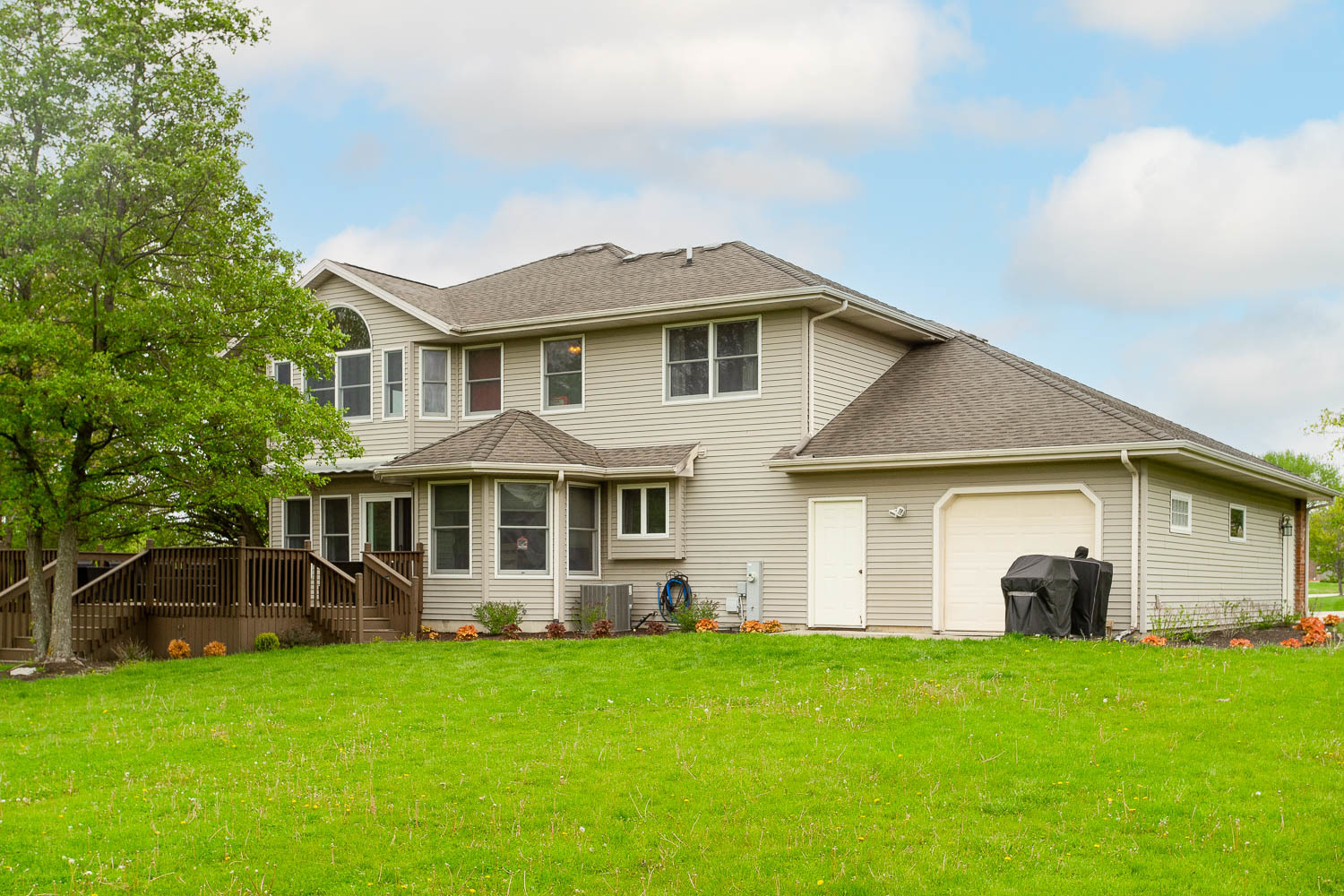 2394 Valley View Drive Kankakee, IL 60901 - Photo 56 of 73 a front view of a house with a yard and trees