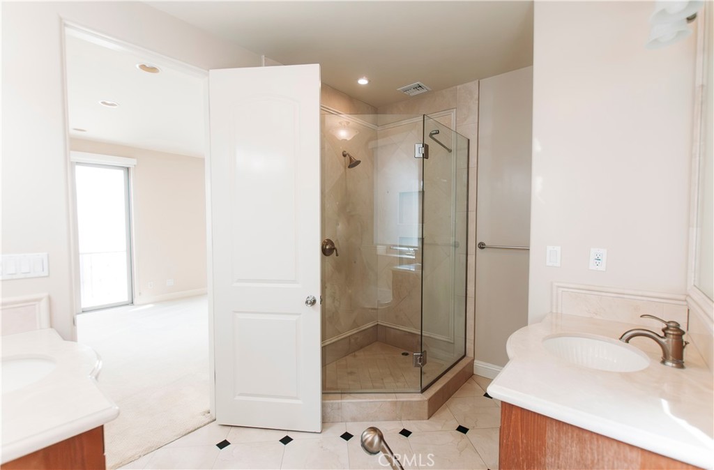 809 20th Street Hermosa Beach, CA 90254 - Photo 22 of 35 a bathroom with a sink and a shower
