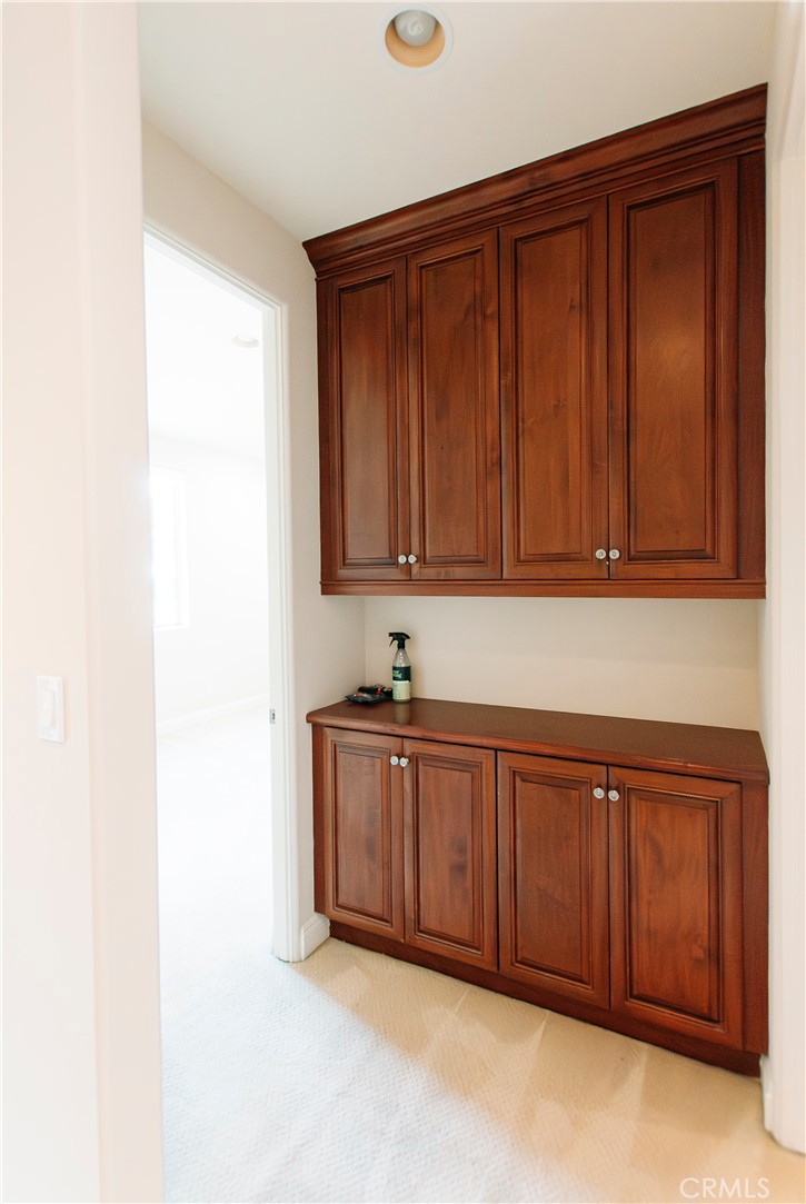 809 20th Street Hermosa Beach, CA 90254 - Photo 24 of 35 a view of a kitchen with wooden cabinets