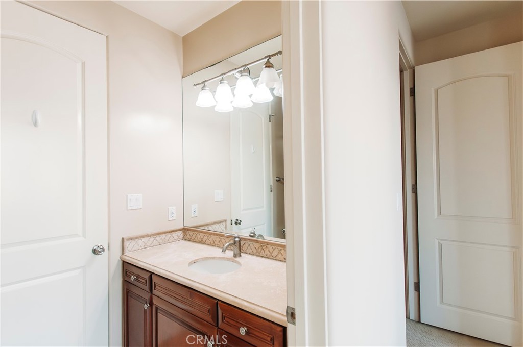 809 20th Street Hermosa Beach, CA 90254 - Photo 28 of 35 a bathroom with a sink and a mirror