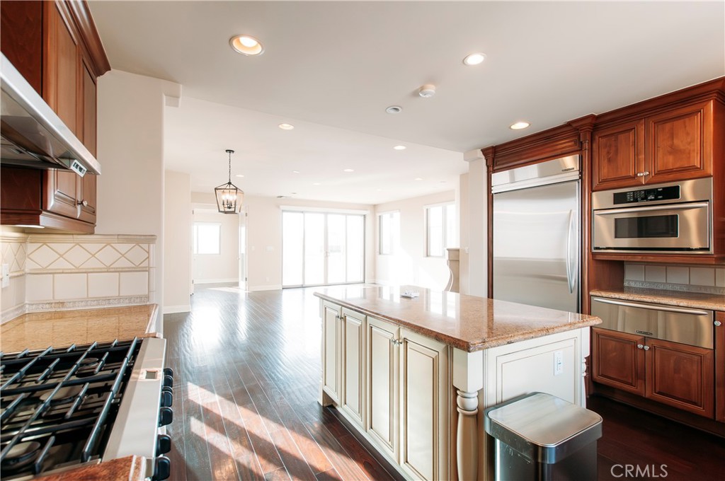 809 20th Street Hermosa Beach, CA 90254 - Photo 5 of 35 a kitchen with a sink stainless steel appliances and cabinets