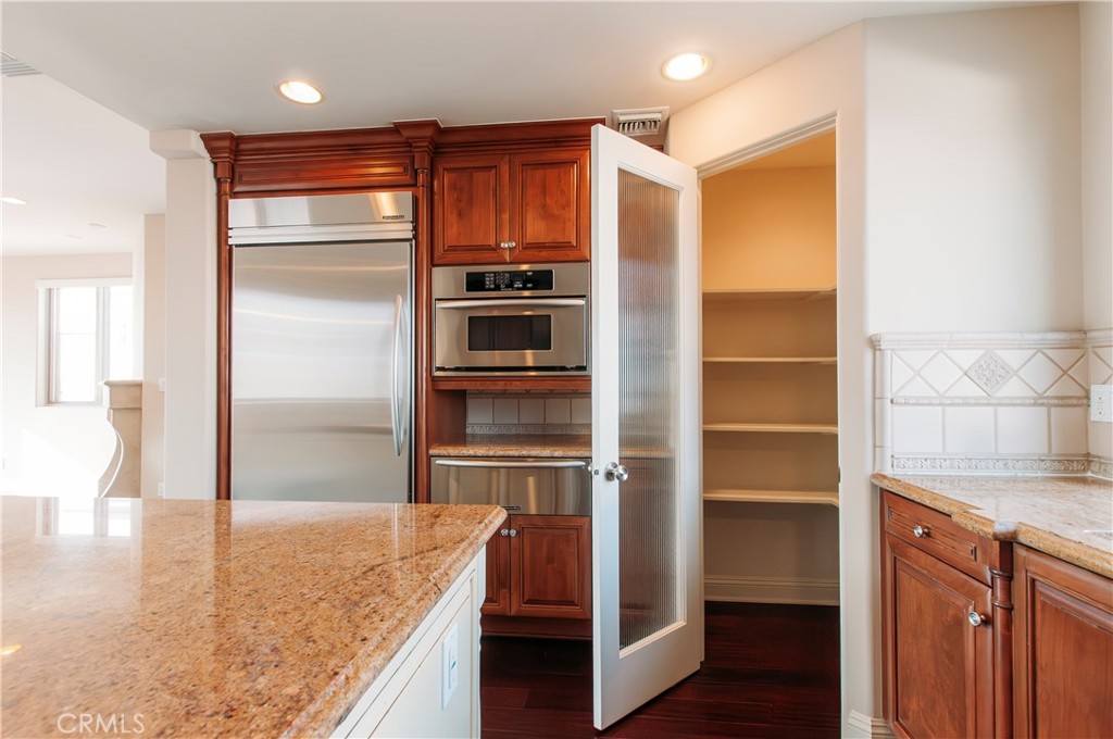 809 20th Street Hermosa Beach, CA 90254 - Photo 6 of 35 a kitchen with kitchen island a counter top and appliances