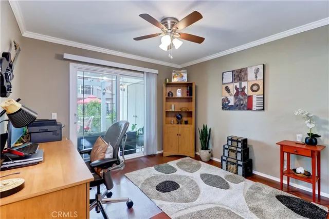 a workspace with furniture and a book shelf