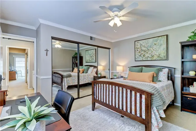 a bathroom with a sink a toilet and shower curtain