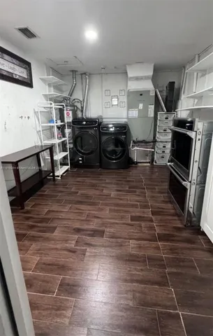 a living room with lots of furniture and a flat screen tv