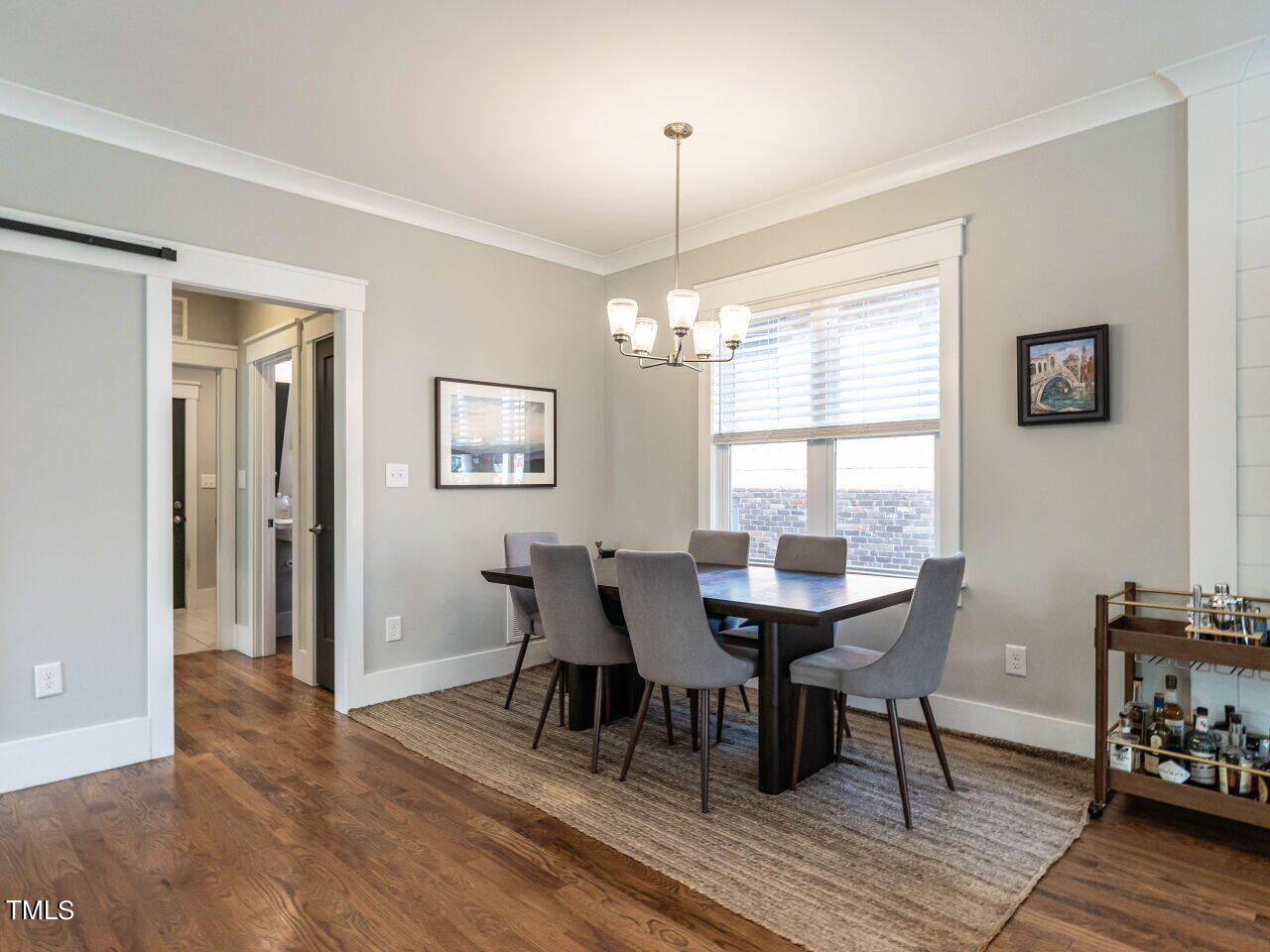 628 Coleman Street Raleigh, NC 27610 - Photo 10 of 38 a view of a dining room with furniture window and wooden floor