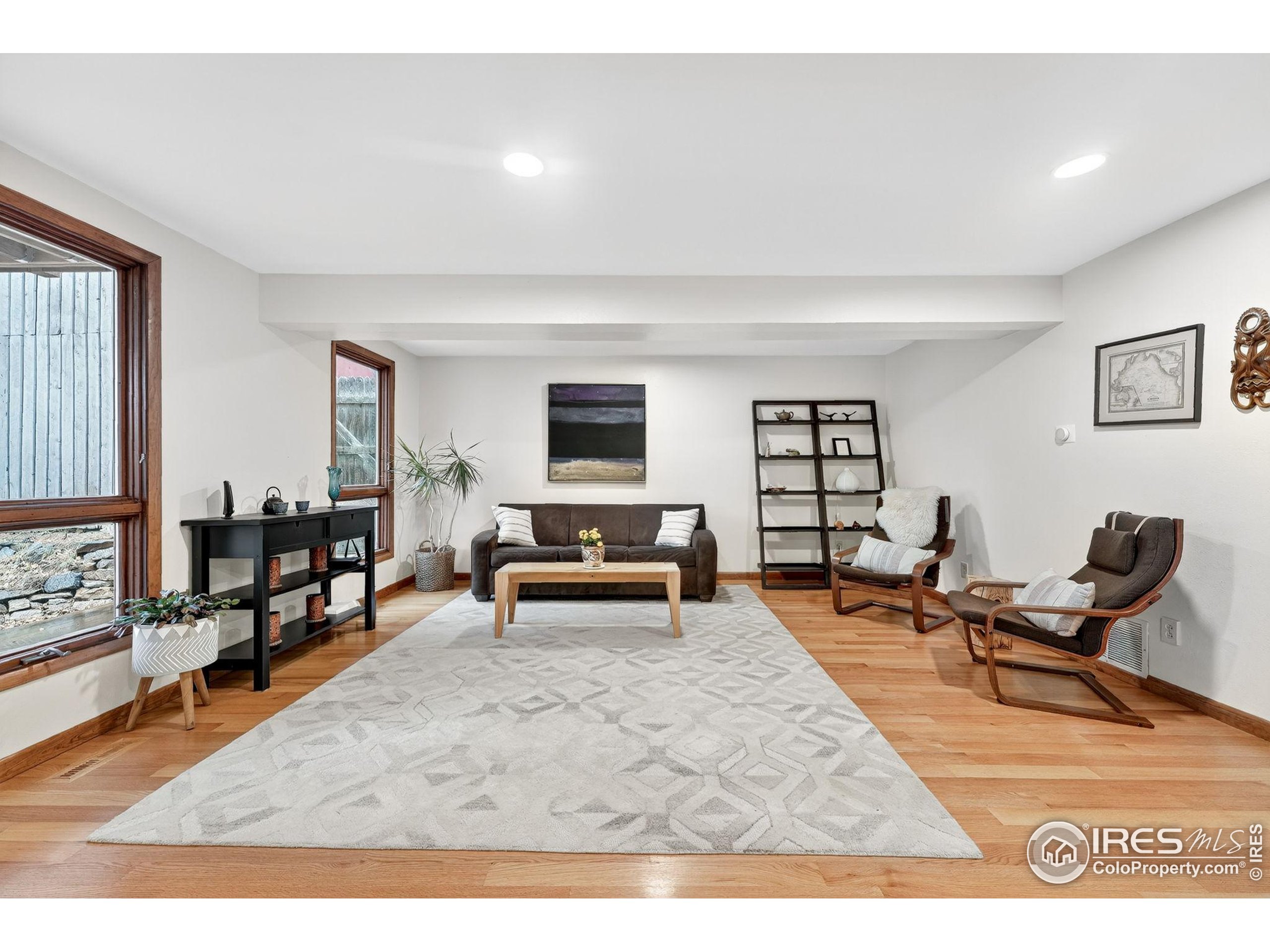 1707 Ridge Road Nederland, CO 80466 - Photo 11 of 50 a living room with furniture and a flat screen tv