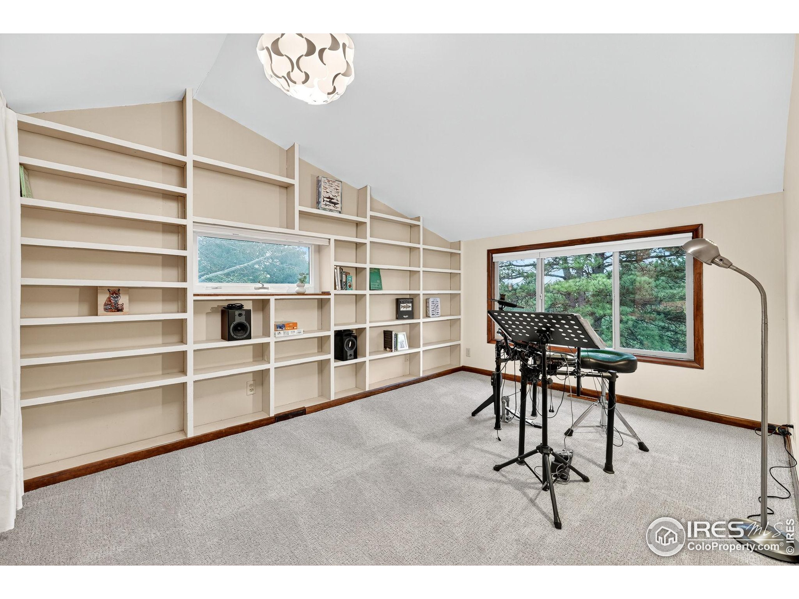 1707 Ridge Road Nederland, CO 80466 - Photo 31 of 50 a room with furniture and a window