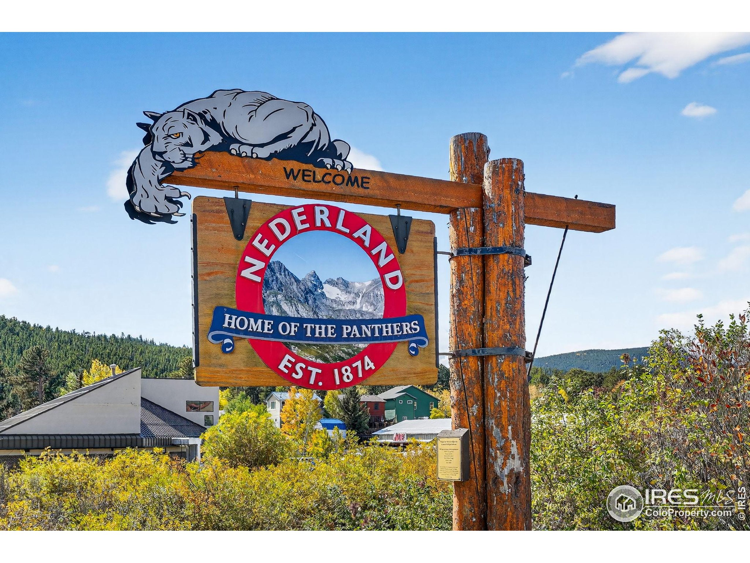 1707 Ridge Road Nederland, CO 80466 - Photo 44 of 50 a street sign on a pole on a street