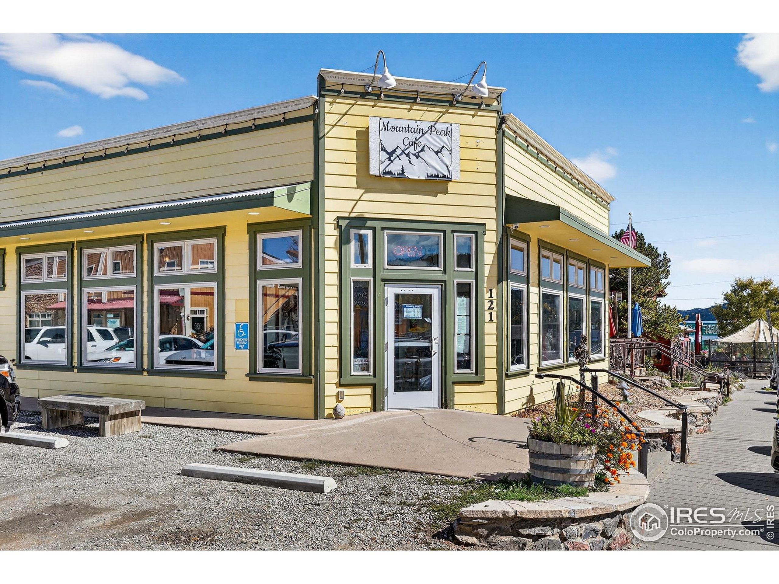 1707 Ridge Road Nederland, CO 80466 - Photo 48 of 50 a view of a brick building with large windows