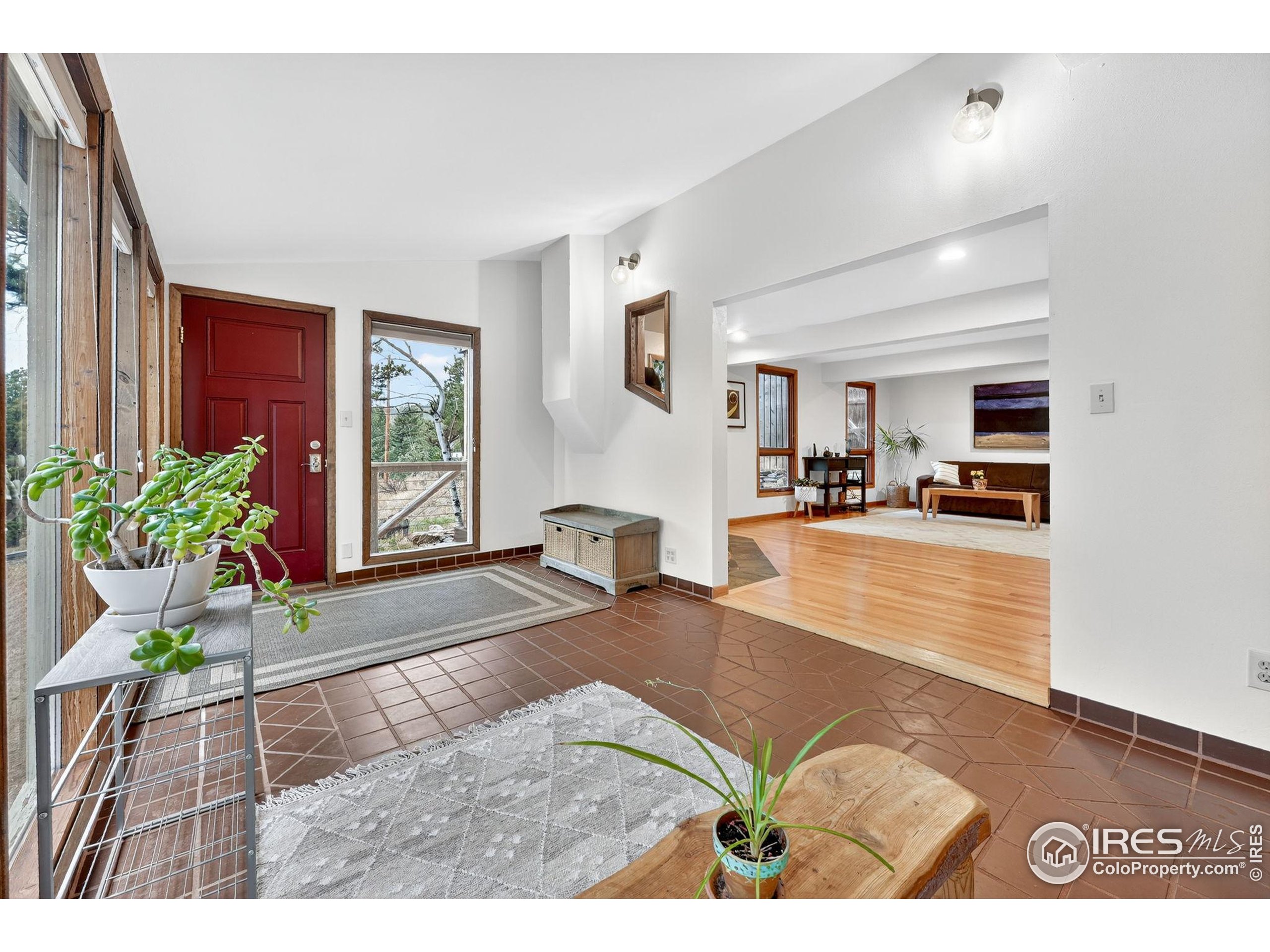 1707 Ridge Road Nederland, CO 80466 - Photo 7 of 50 a view of living room and kitchen with furniture