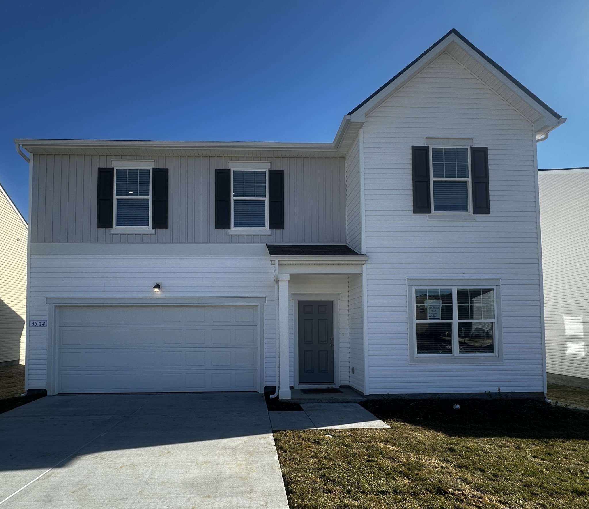 a house view with a backyard space