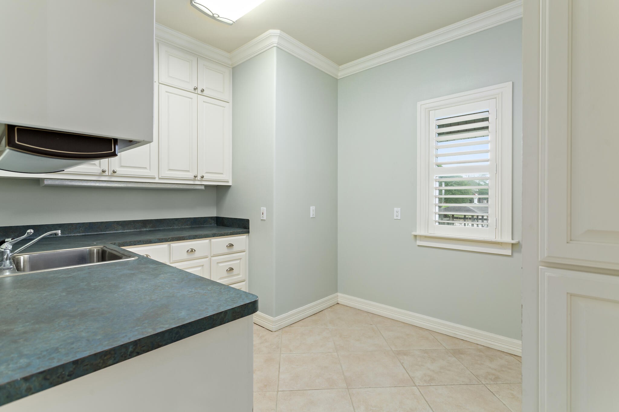 145 Greenhead Point Orange, TX 77630 - Photo 20 of 49 a kitchen with stainless steel appliances granite countertop a sink and a stove