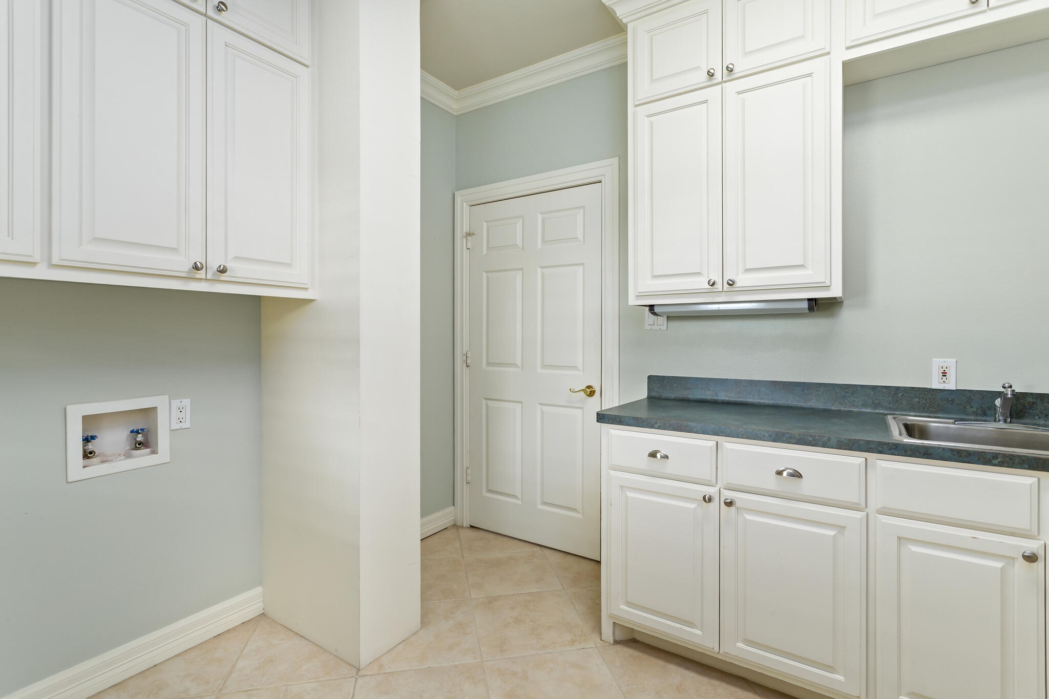 145 Greenhead Point Orange, TX 77630 - Photo 21 of 49 a kitchen with granite countertop white cabinets and a sink