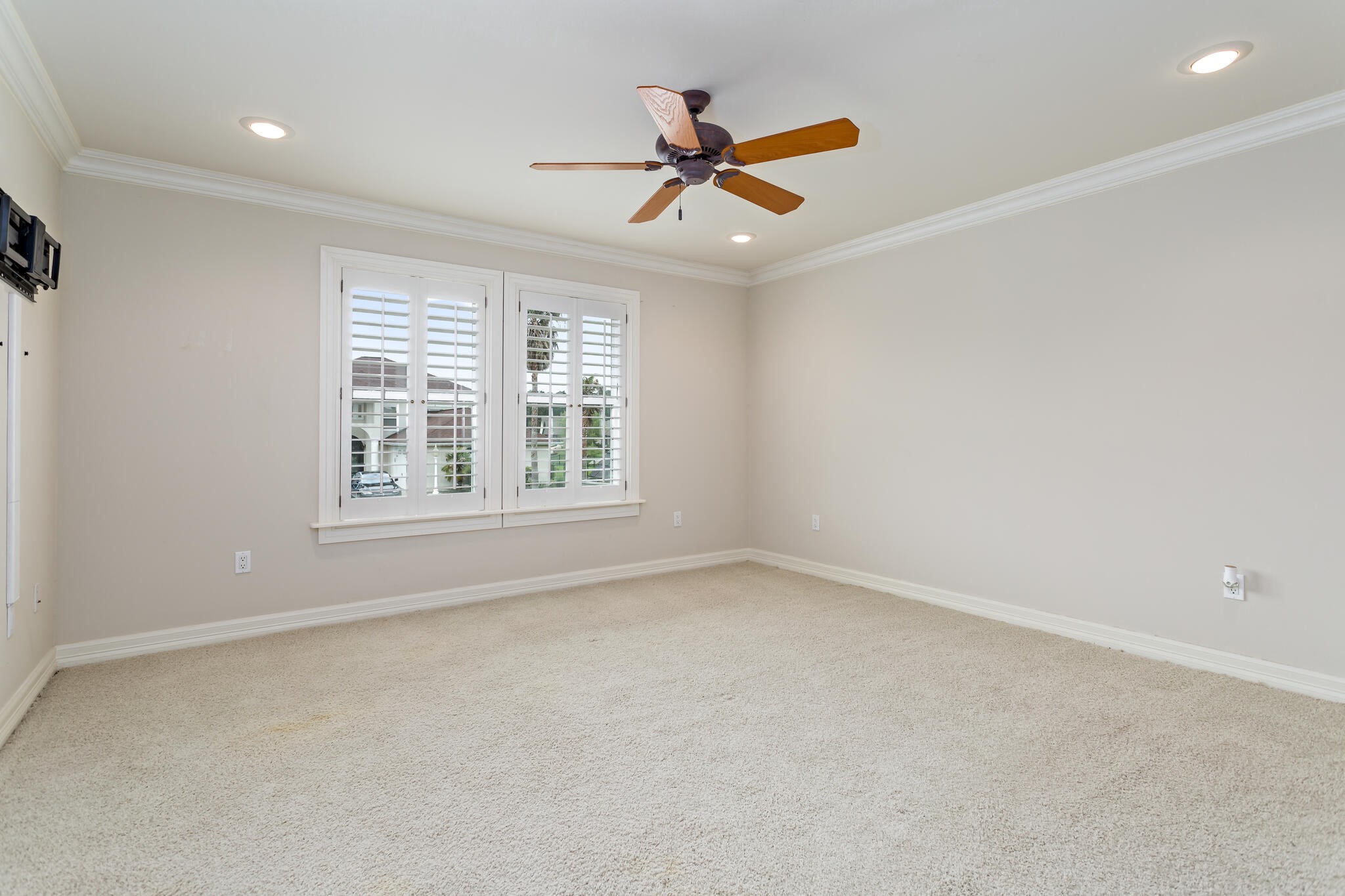 145 Greenhead Point Orange, TX 77630 - Photo 30 of 49 an empty room with ceiling fan and windows