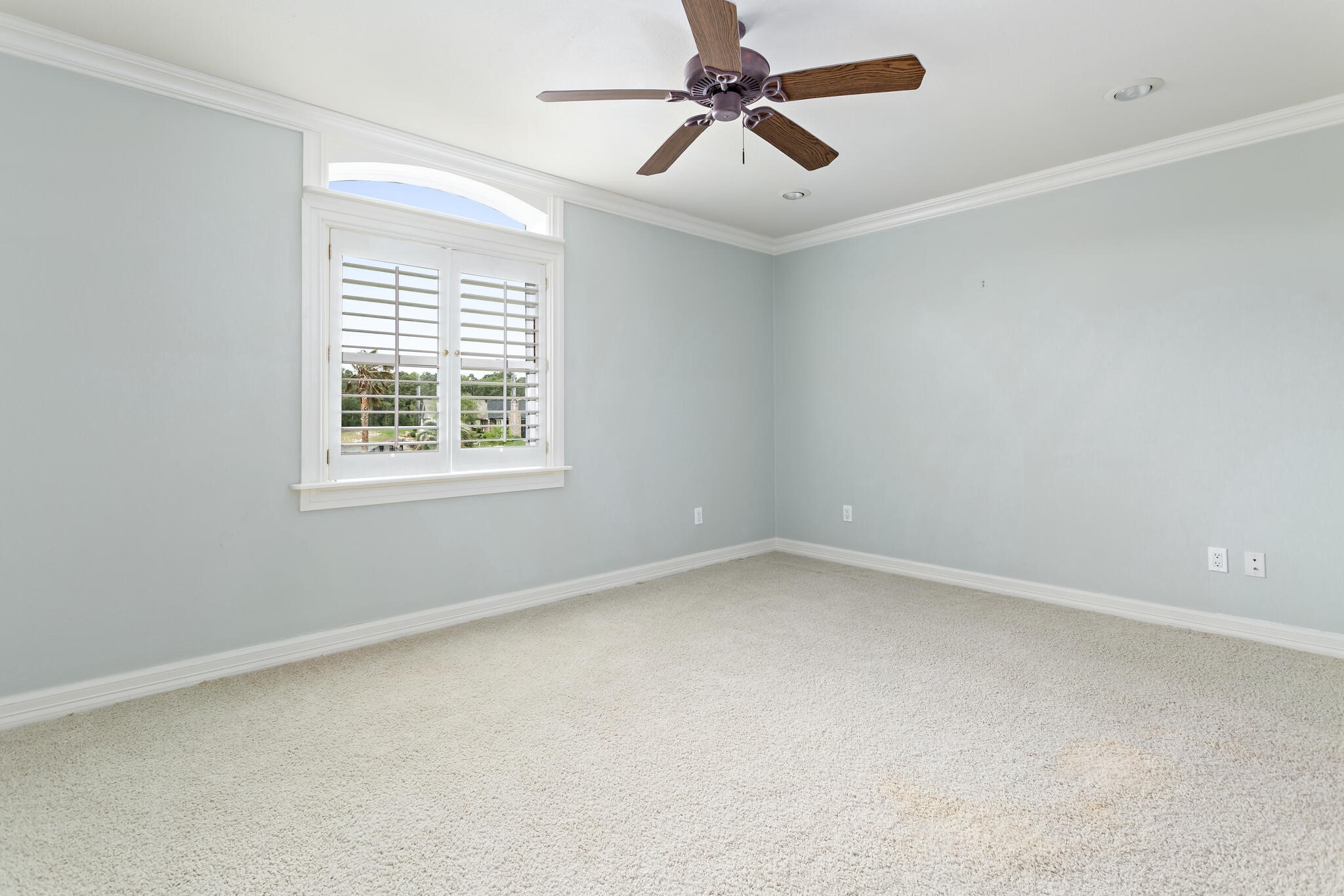 145 Greenhead Point Orange, TX 77630 - Photo 31 of 49 an empty room with a window and a fan
