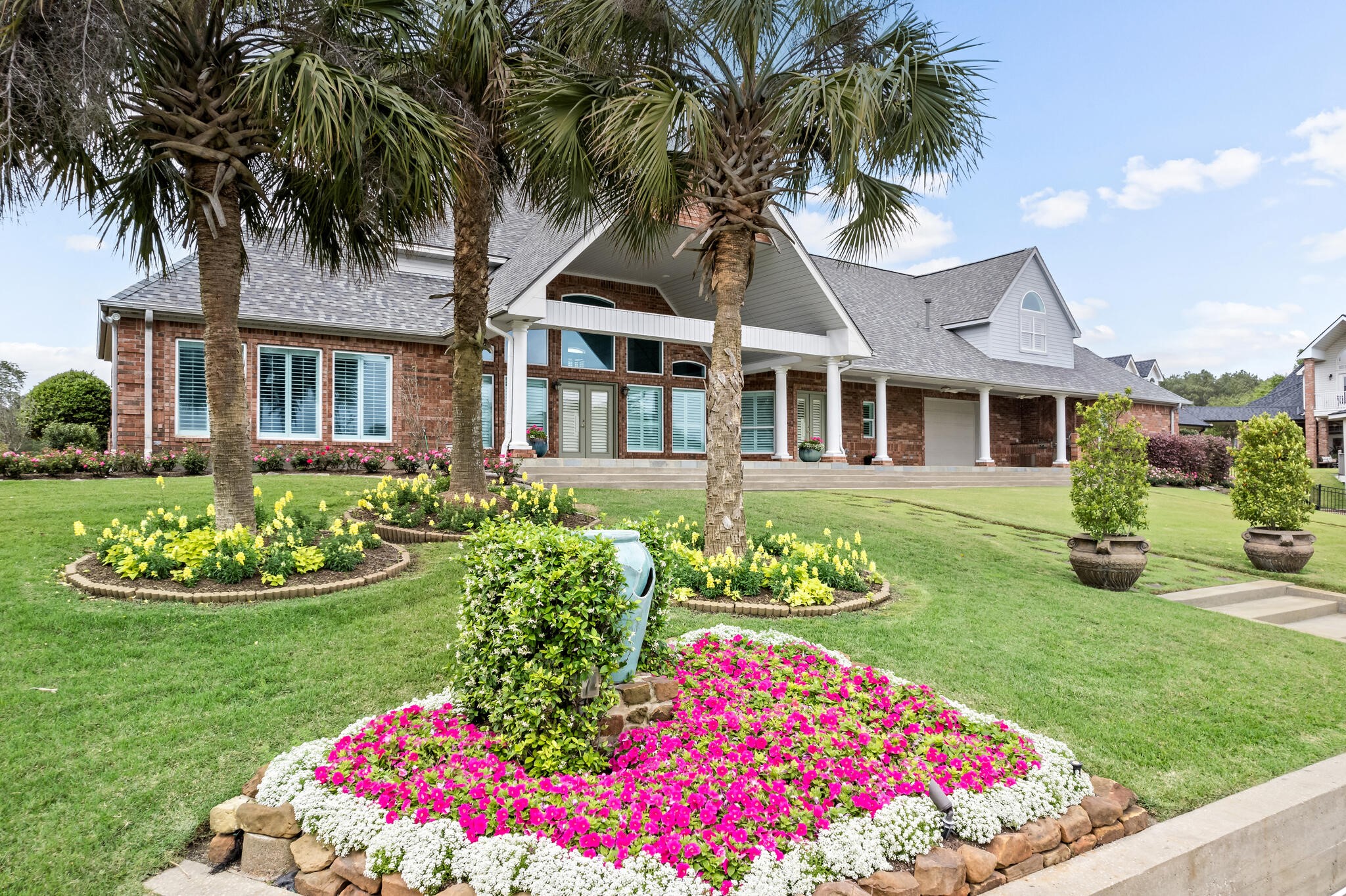 145 Greenhead Point Orange, TX 77630 - Photo 39 of 49 a front view of a house with a garden and trees