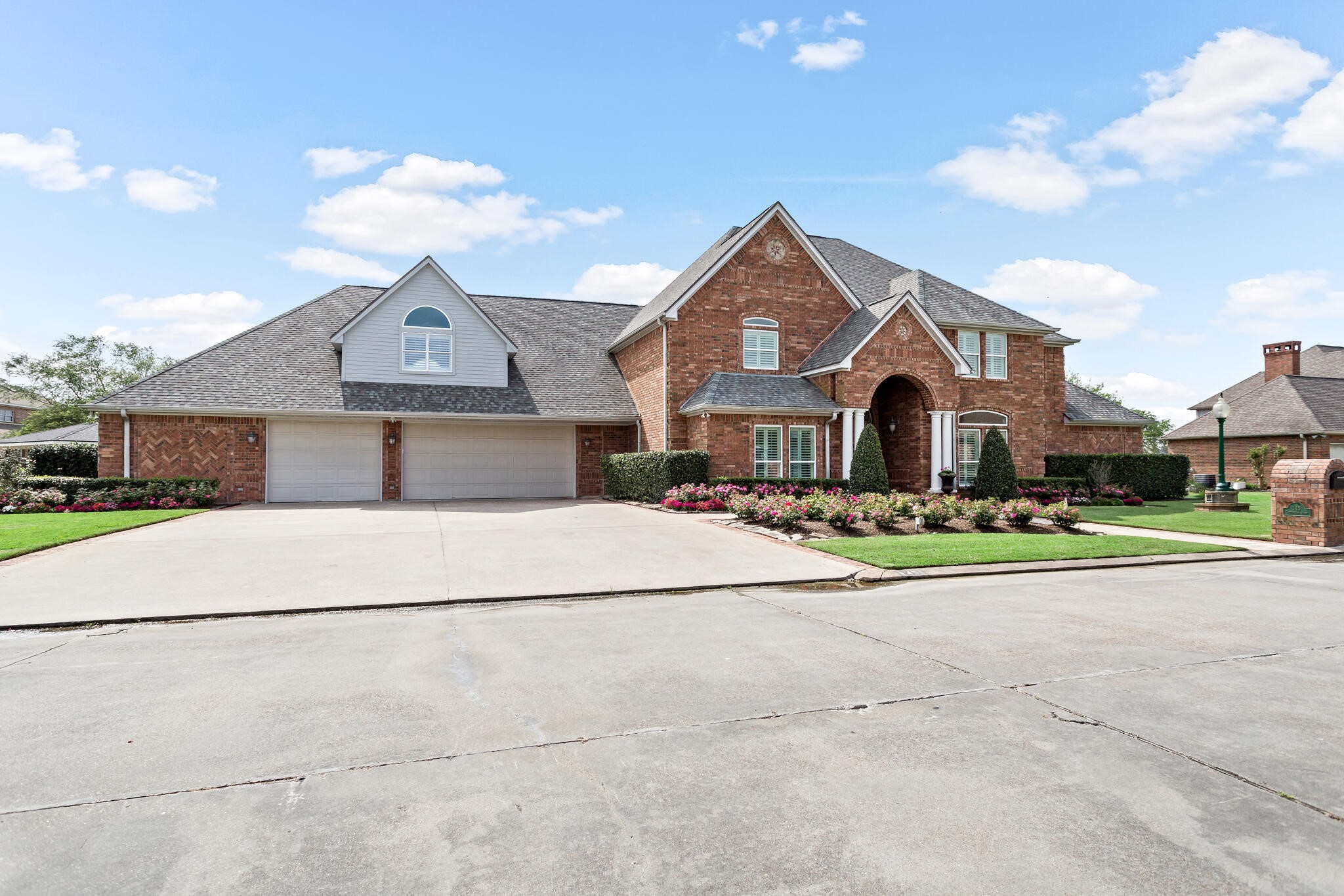 145 Greenhead Point Orange, TX 77630 - Photo 4 of 49 a front view of a house with a yard and garage