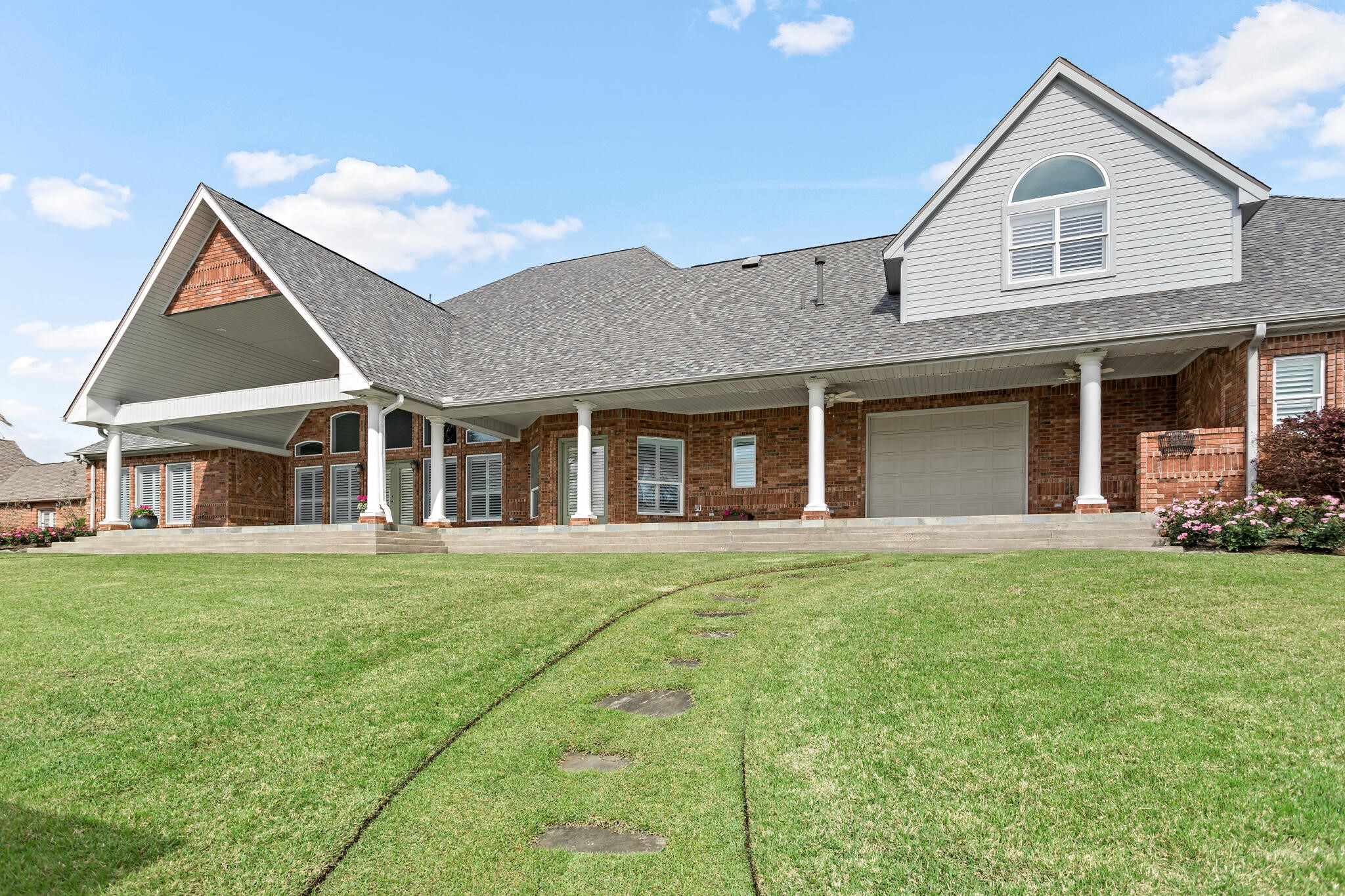 145 Greenhead Point Orange, TX 77630 - Photo 41 of 49 a front view of a house with a garden