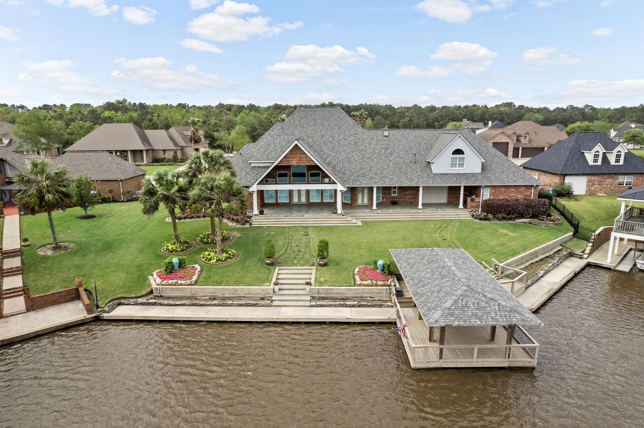 145 Greenhead Point Orange, TX 77630 - Photo 48 of 49 an aerial view of a house with swimming pool and garden