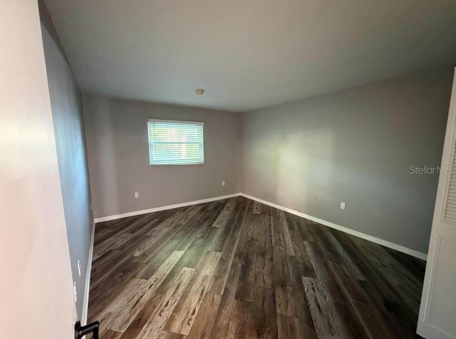 5800 Hollywood Boulevard, Unit 324 Sarasota, FL 34231 - Photo 7 of 11 a view of an empty room and window